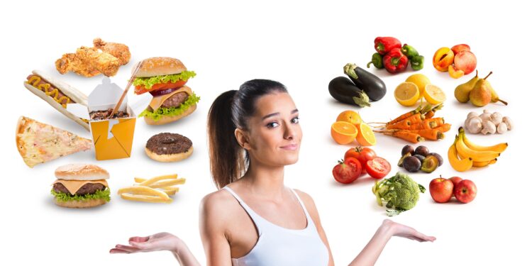 A woman floating around her head healthy and unhealthy food.