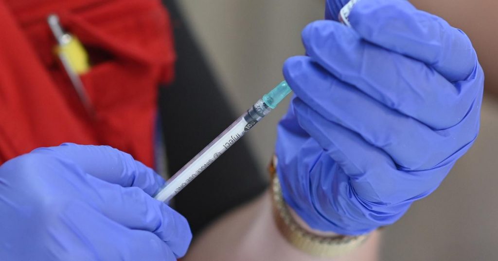 WHO chief calls booster vaccinations for healthy people a 'scandal'
