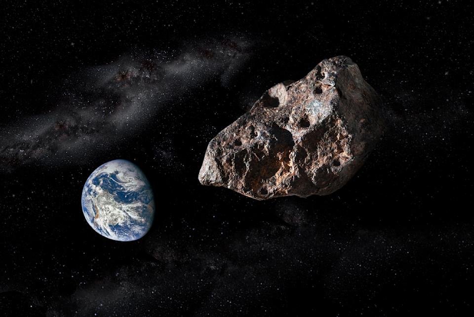Asteroid heading towards Earth in space. 