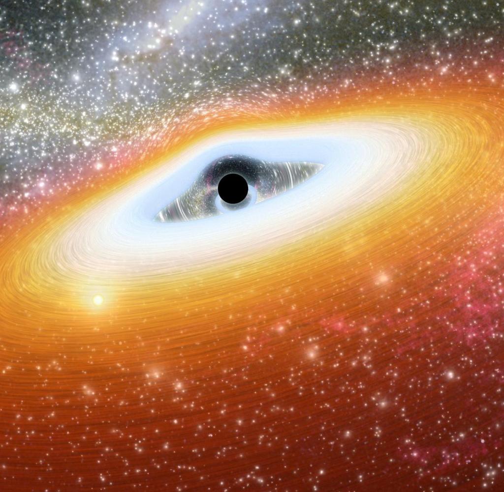 This artist's rendering shows one of the most primitive supermassive black holes known (the central black point) in the heart of a young, star-rich galaxy.  (Photo: Photo12/Universal Images Group via Getty Images)