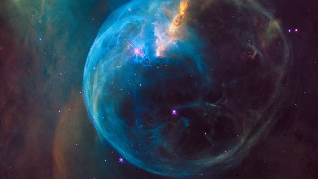 The Bubble Nebula (NGC 7635) in the constellation Cassiopeia is an emission nebula located approximately 7,100 light-years from Earth.  The bubble shape is formed by stellar winds from a star ejecting large amounts of gas.  The gases collide with a huge molecular cloud located in this region - a shock wave is created which forms the outer envelope of the gas bubble.