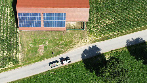 Farmhouse with solar roof, view from above