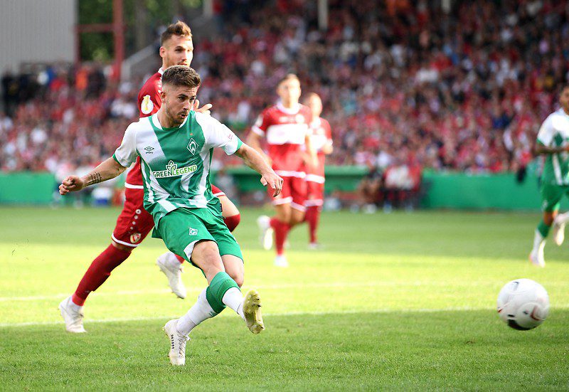 Romano Schmid of Werder Bremen scores a goal against Cottbus