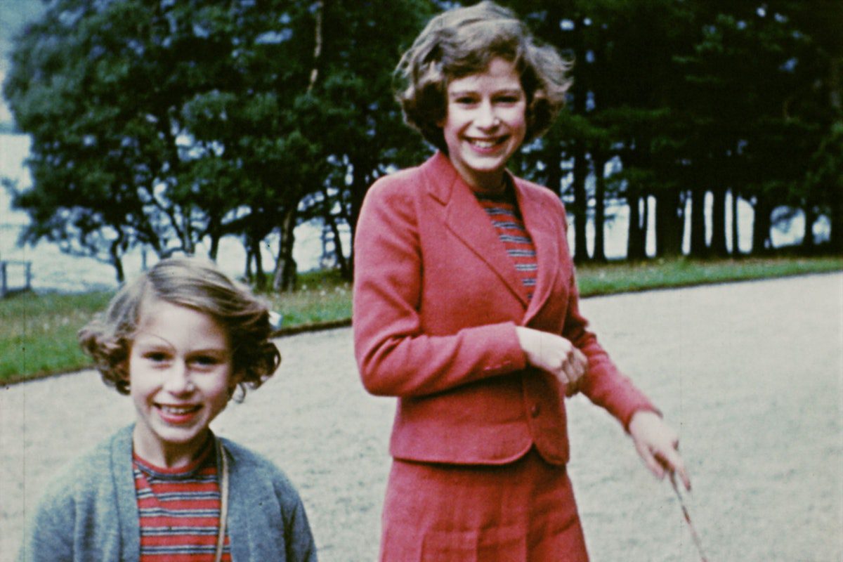 Human, friendly, and private: then-Princess Elizabeth (right) with her sister Margaret in 1939.