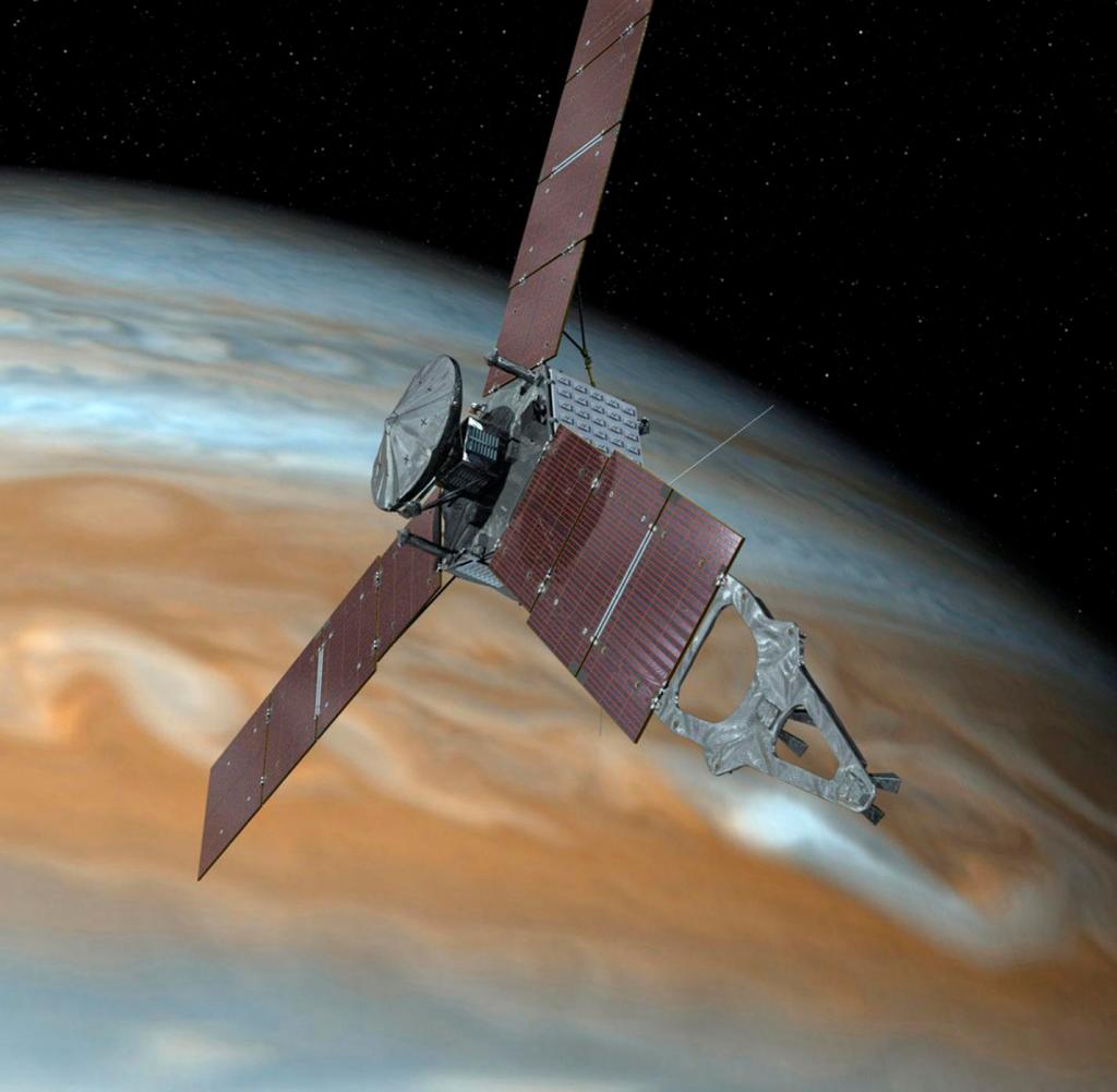 This illustration depicts NASA's Juno spacecraft making one of its close passes over Jupiter.  Juno took its closest approach to Jupiter's exciting icy moon Europa in more than 20 years on Thursday, September 29, 2022 (NASA via AP)